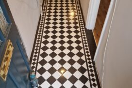 black and white hallway tiles